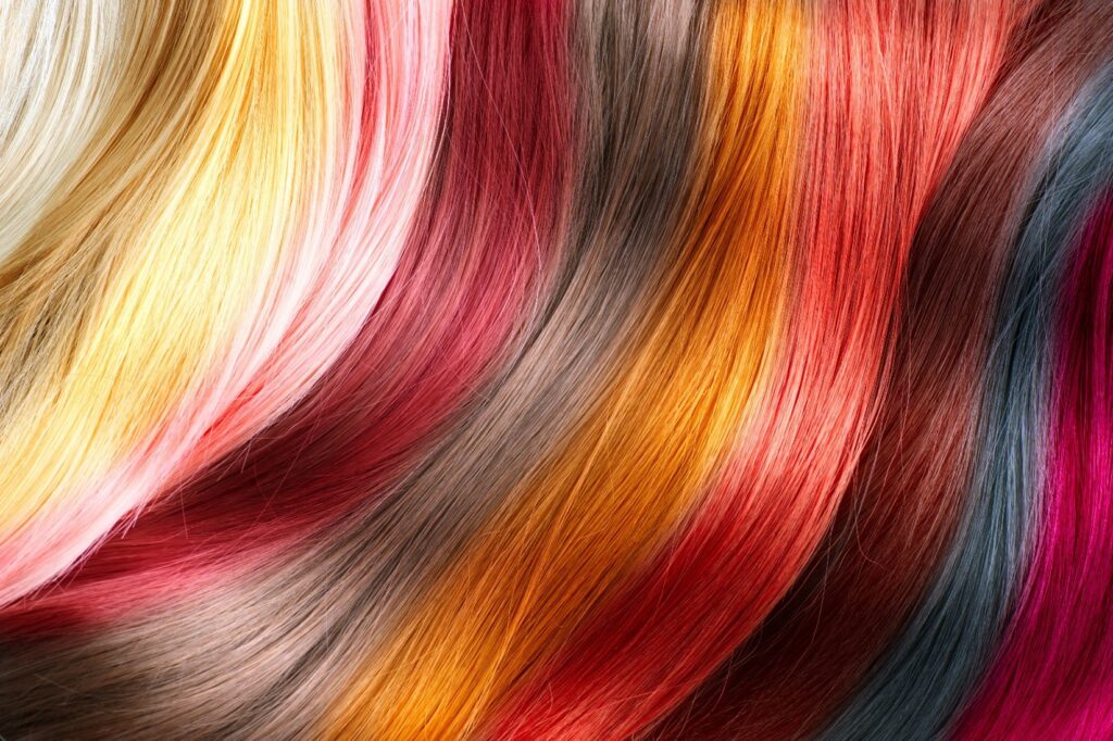 Close up of hair in various hues all next to each other.